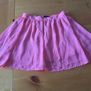 Coral swing skirt with gold crosses